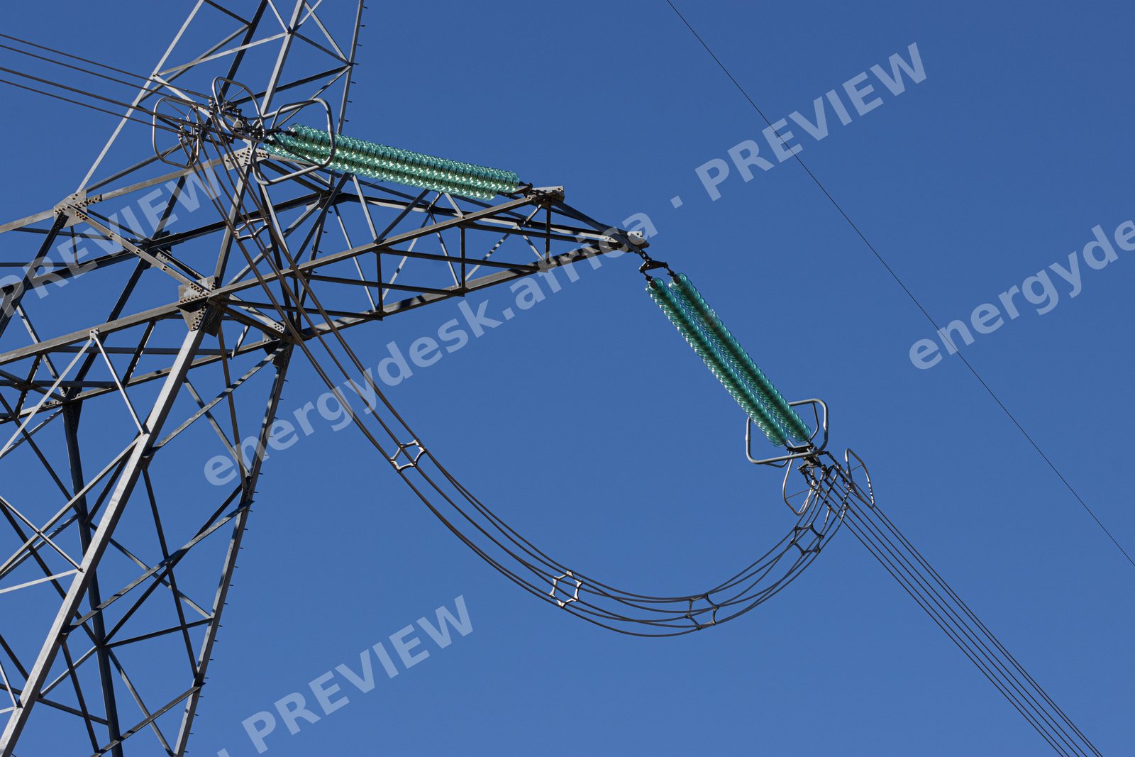 Glass insulator strings on a Karoo transmission pylon