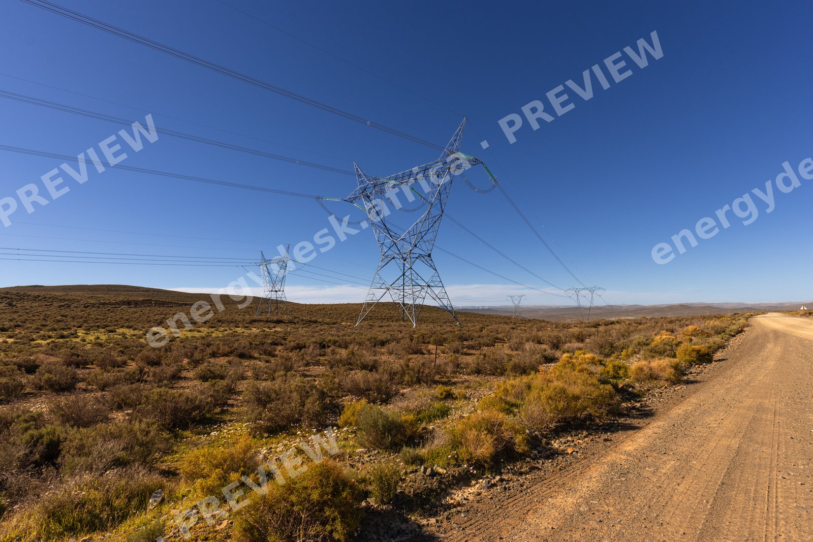 Power lines along a Karoo gravel road, Sutherland district