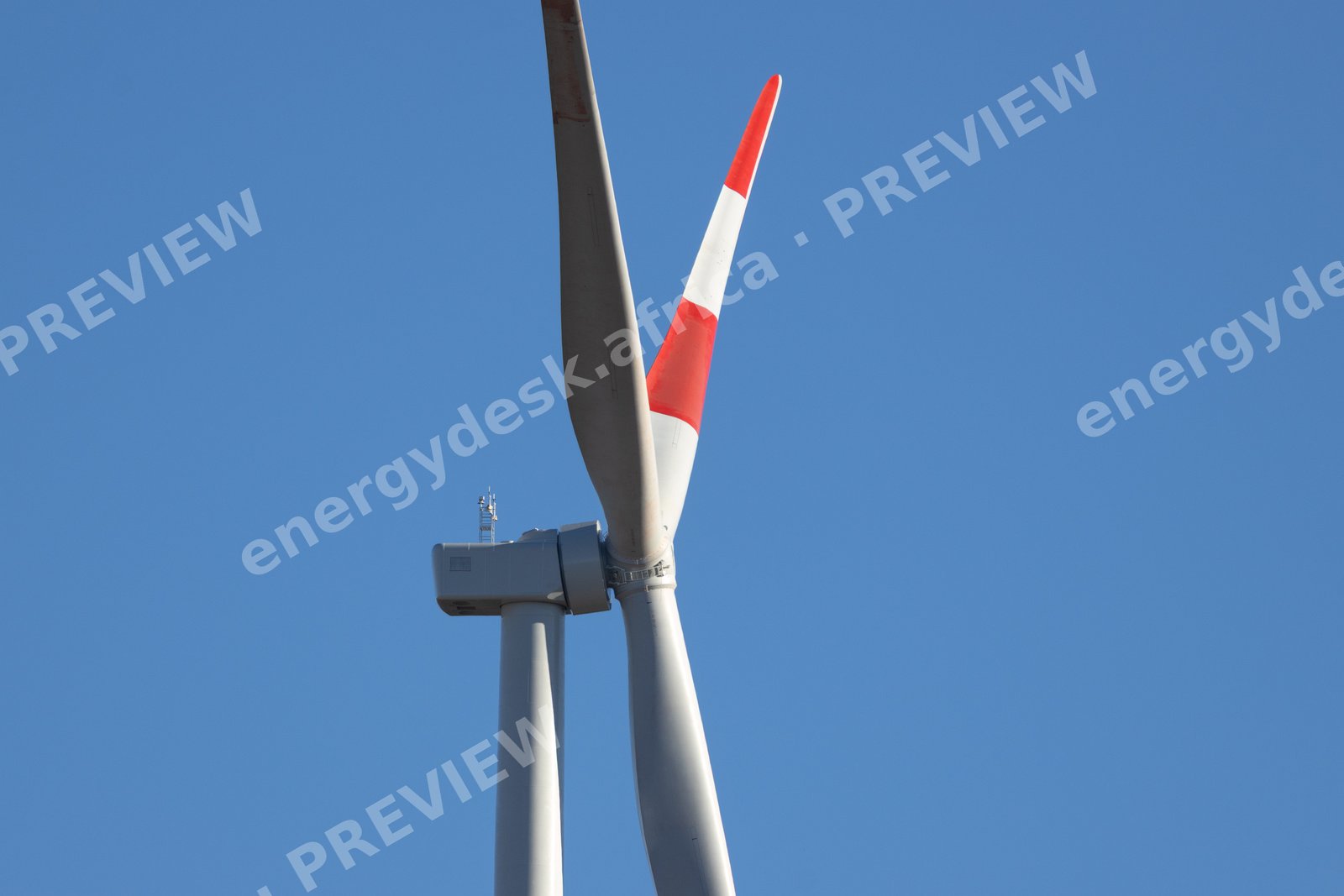Red-tipped turbine blades against a Karoo sky, Karreebosch Wind Farm
