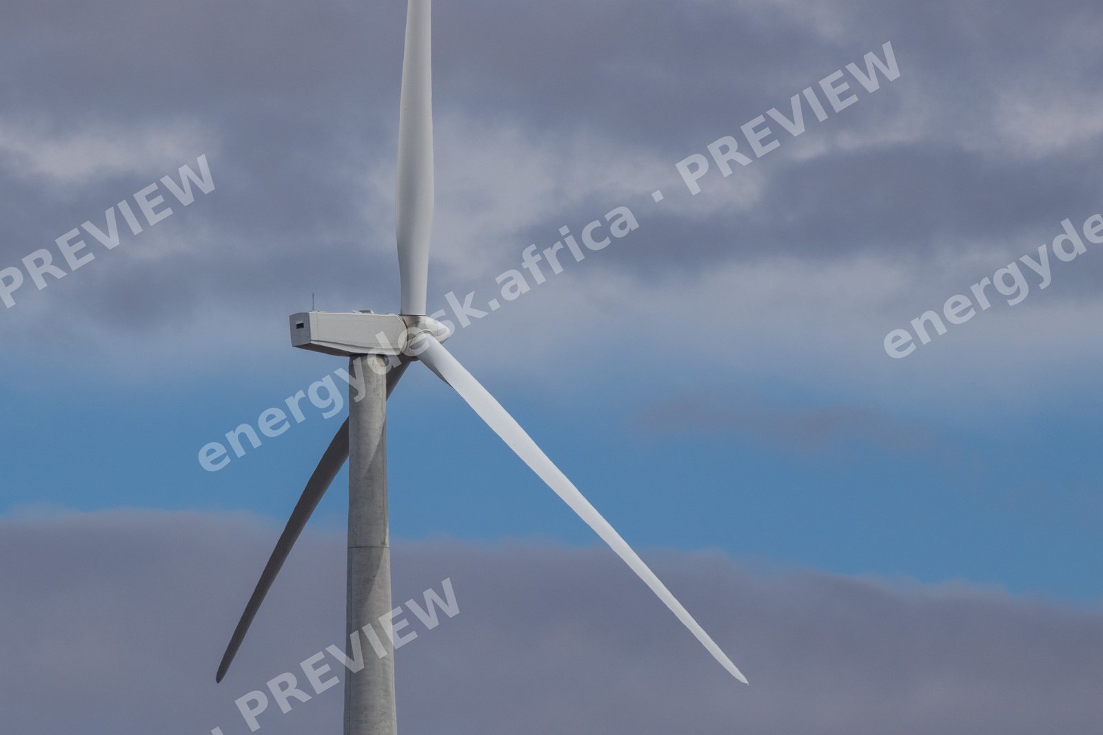 Turbine against gathering Karoo storm clouds, Roggeveld Wind Farm