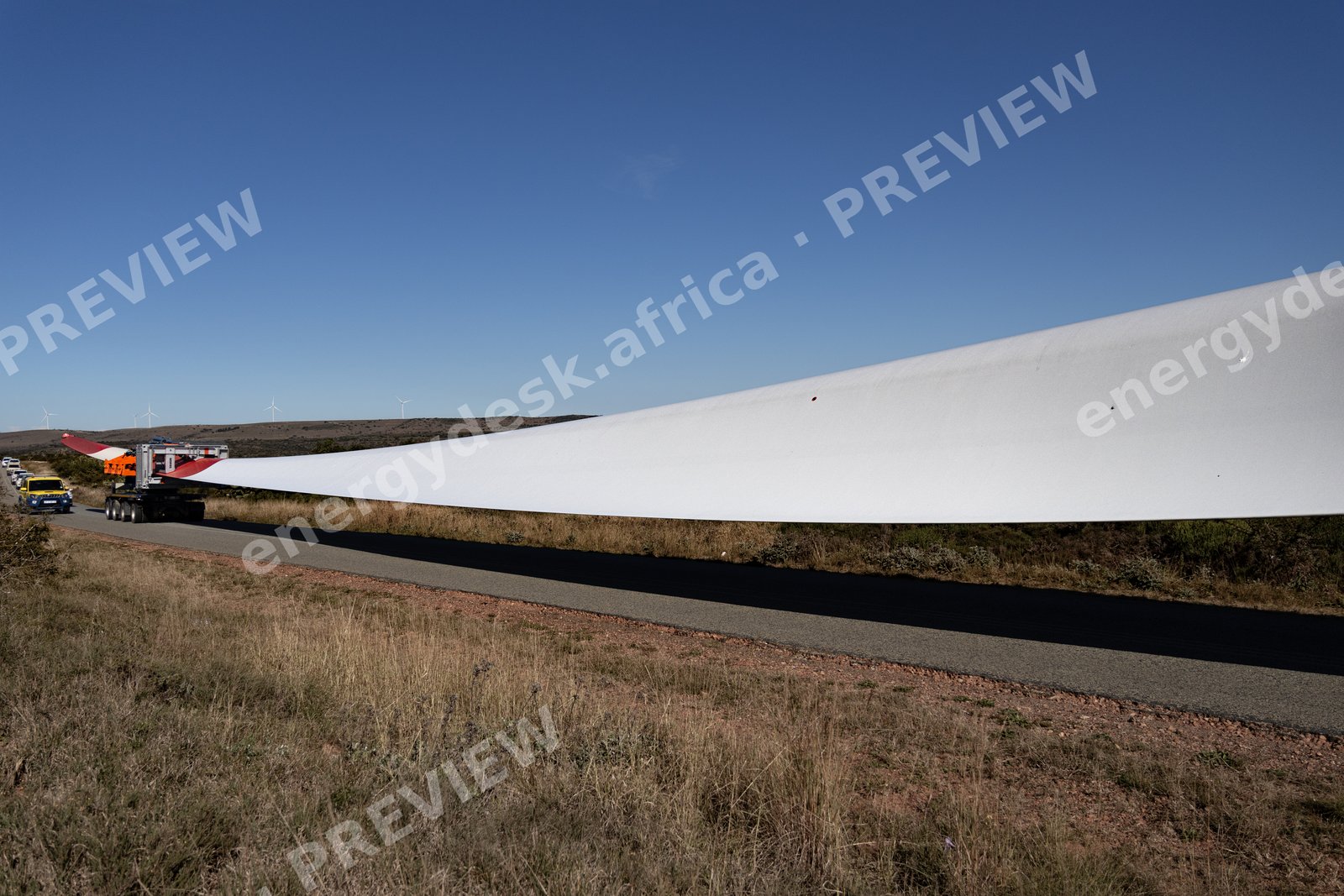 Wind turbine blade sweeping low over the road, Wind Garden convoy