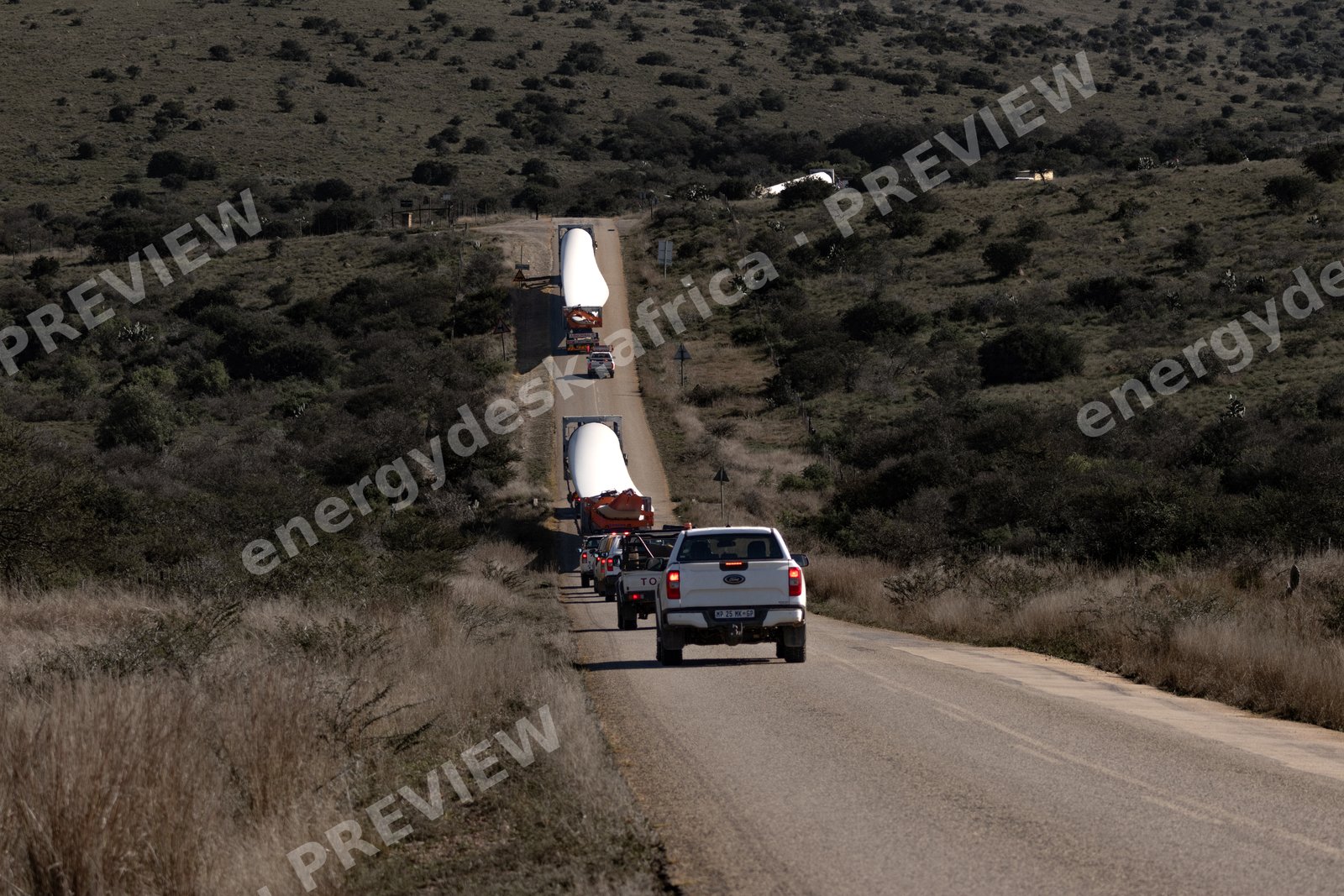 Turbine component convoy climbing through Eastern Cape thicket on the R350